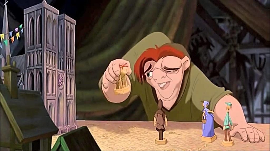 Quasimodo with a model replica of the Notre Dame